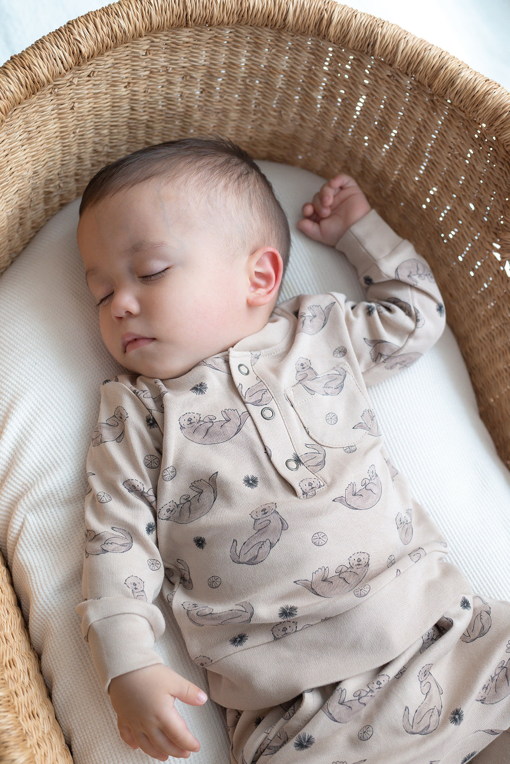 Child wearing Organic Henley Sweatshirt & Jogger Set in Sea Otter.