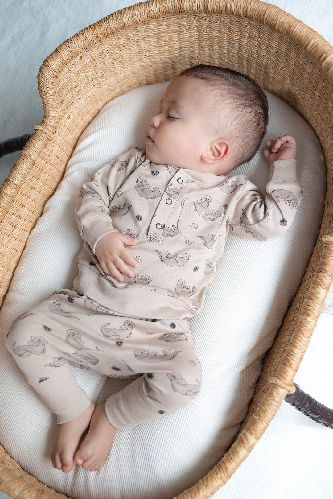 Child wearing Organic Henley Sweatshirt & Jogger Set in Sea Otter.