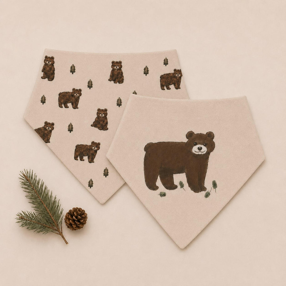 Child wearing Organic Bandana Bib, 2-Pack in Black Bear.
