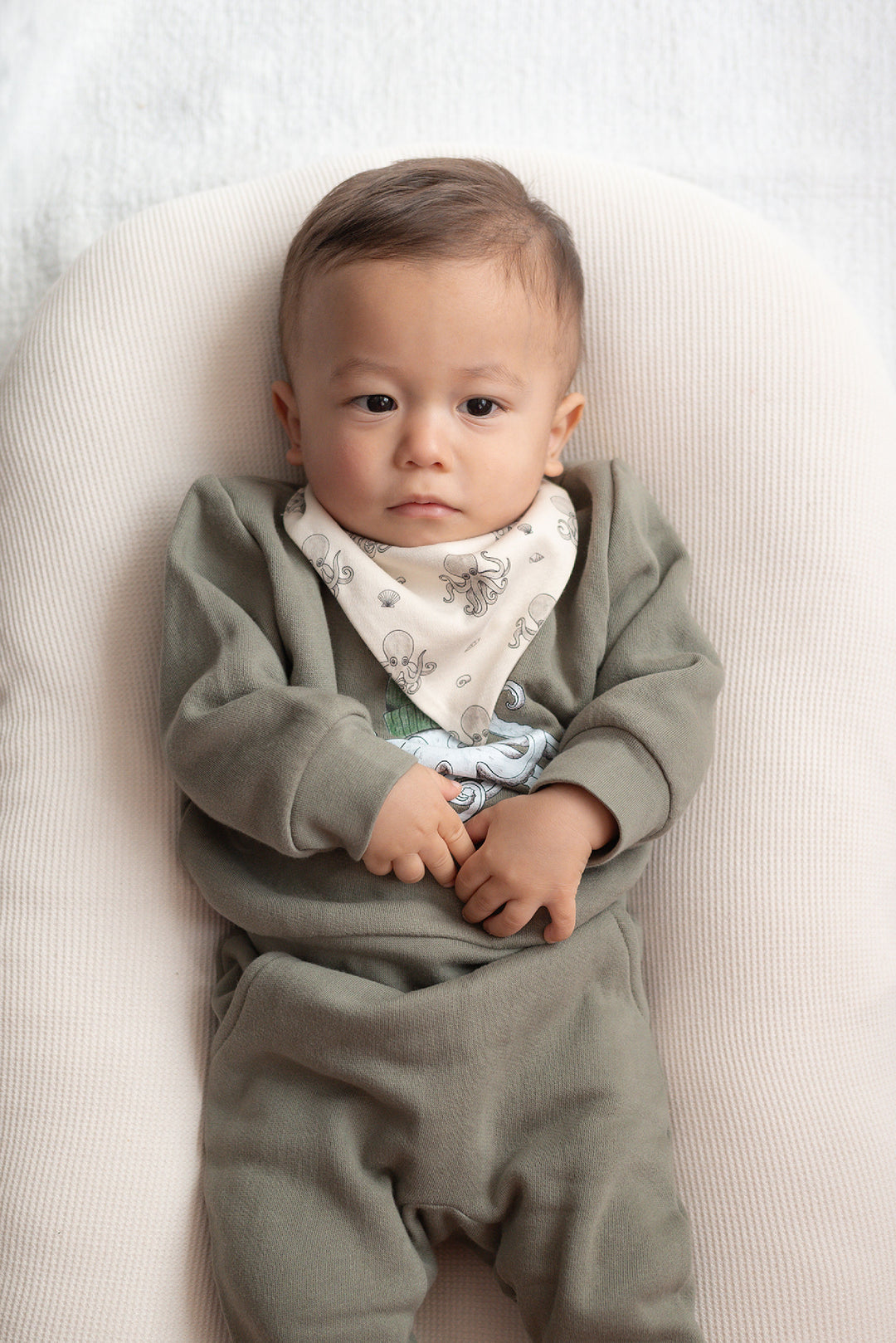 Child wearing Organic Bandana Bib, 2-Pack in Octopus.