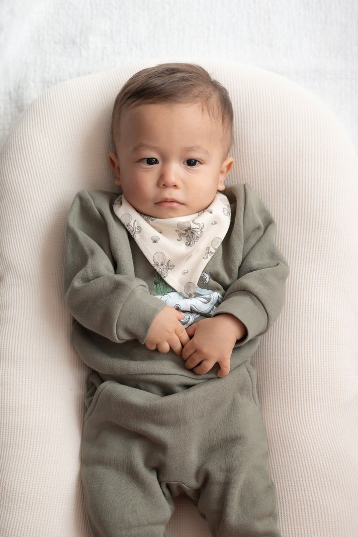 Child wearing Organic Bandana Bib, 2-Pack in Octopus.