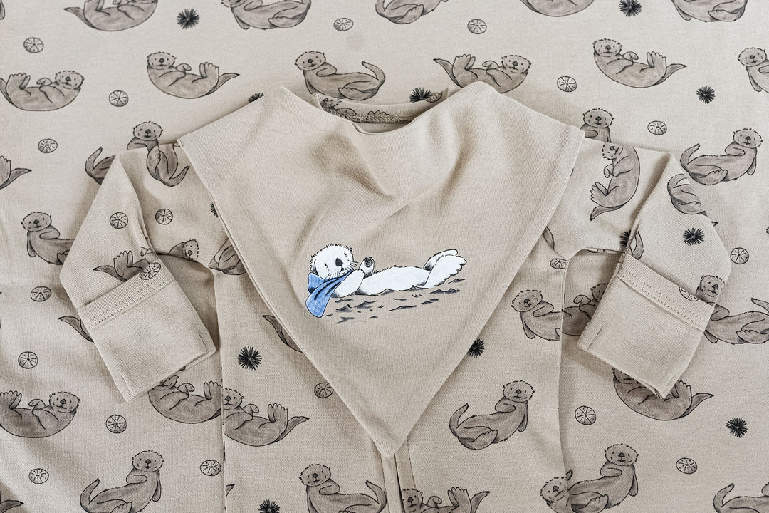 Child wearing Organic Bandana Bib, 2-Pack in Sea Otter.