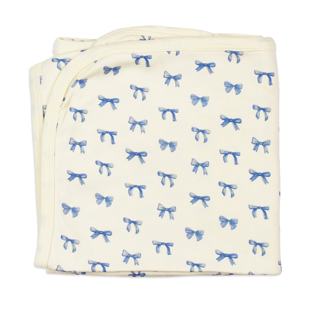 flat image of folded swaddle blanket in blue ribbon print