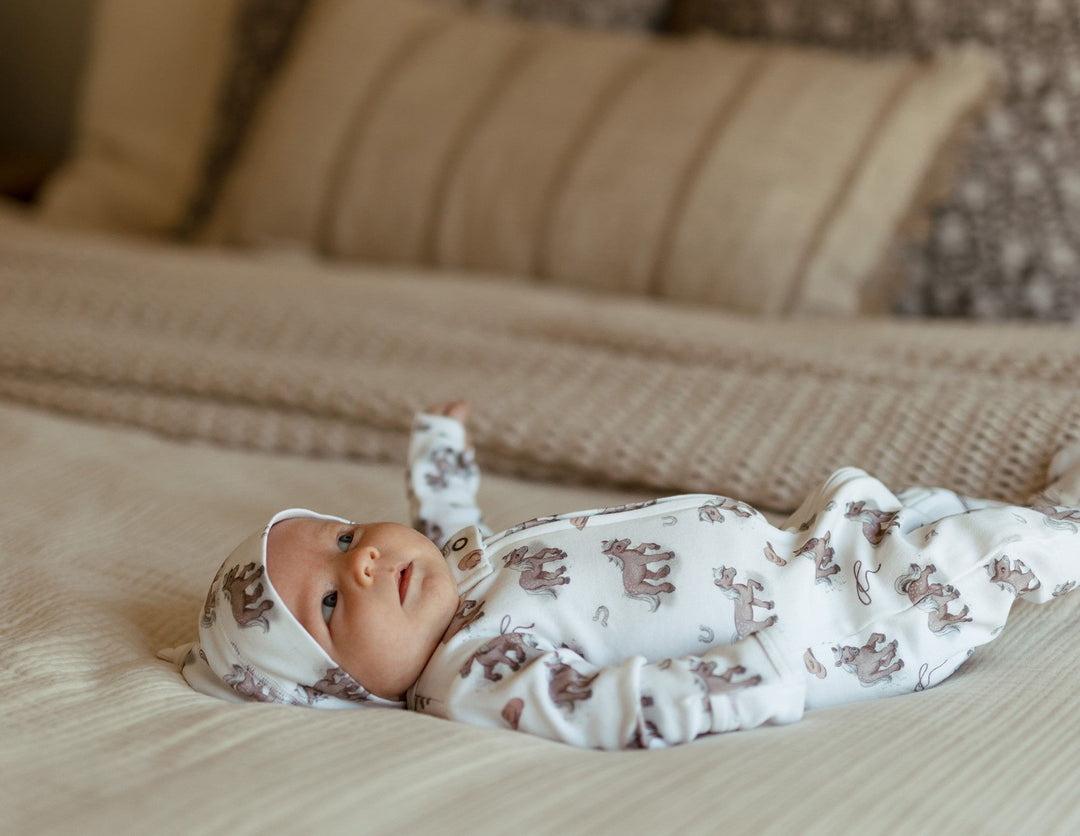 Child wearing Organic Knotted Hat in Little Lasso.