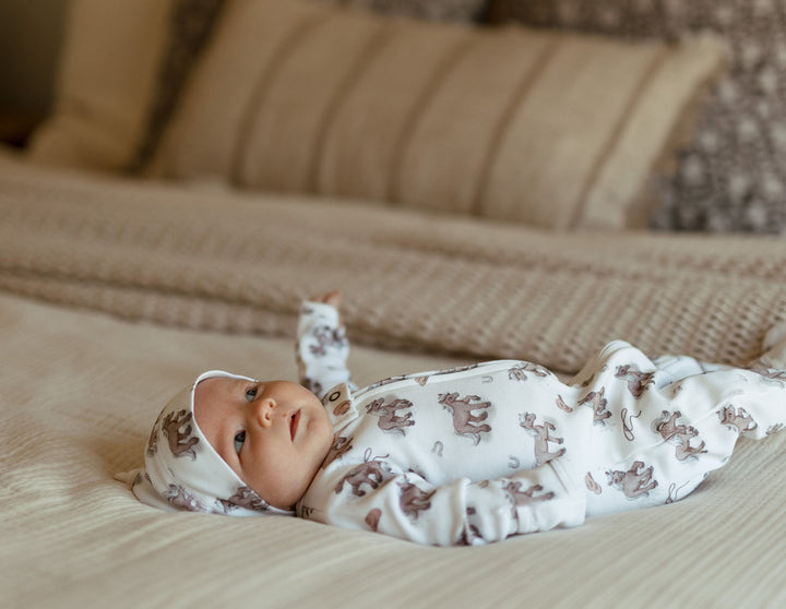 Child wearing Organic Knotted Hat in Little Lasso.