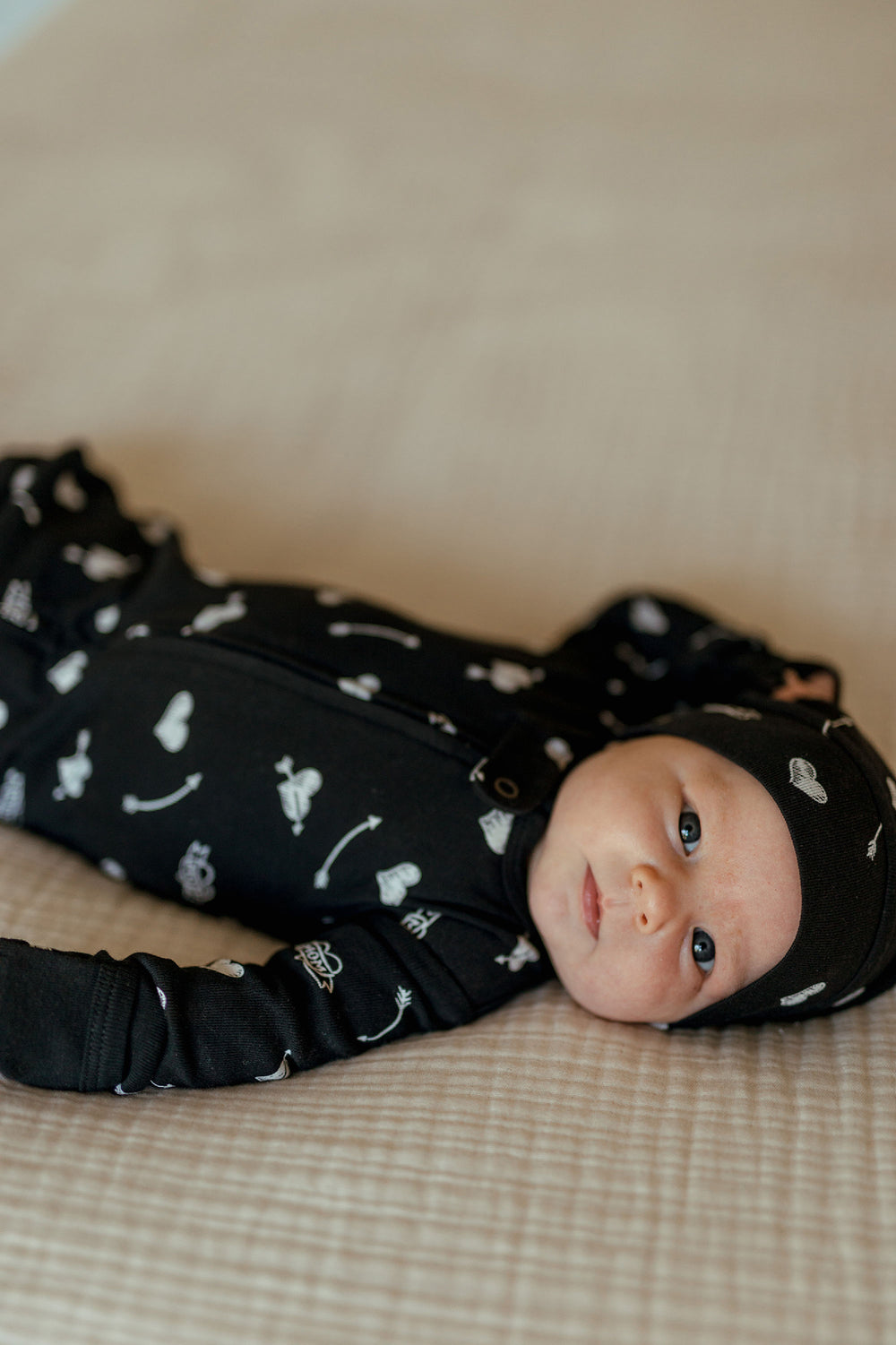 Child wearing Organic Knotted Hat in Mom Heart.