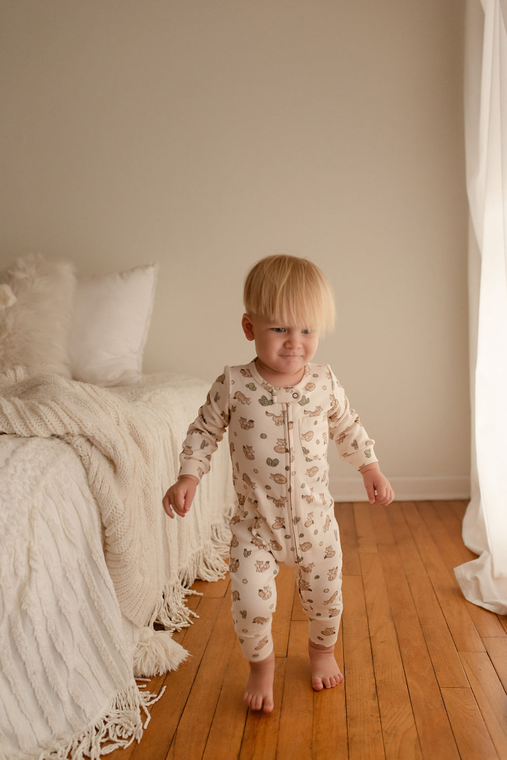 Child wearing Organic Footless 2-Way Zipper Romper in Little Fox.