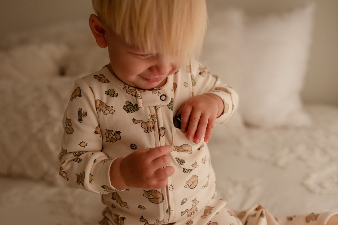 Child wearing Organic Footless 2-Way Zipper Romper in Little Fox.