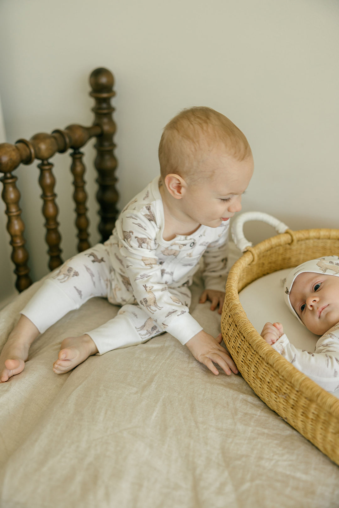 Child wearing Organic Footless 2-Way Zipper Romper in Llama.