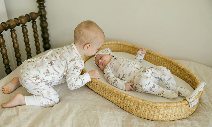 Child wearing Organic Footless 2-Way Zipper Romper in Llama.
