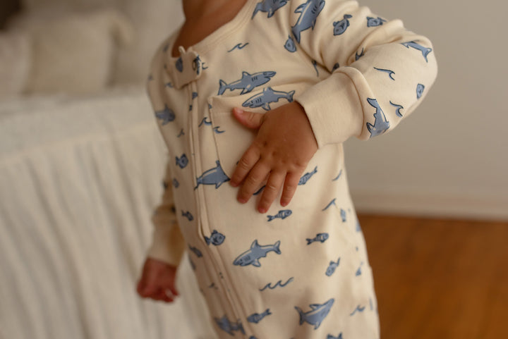 Child wearing Organic Footless 2-Way Zipper Romper in Shark.