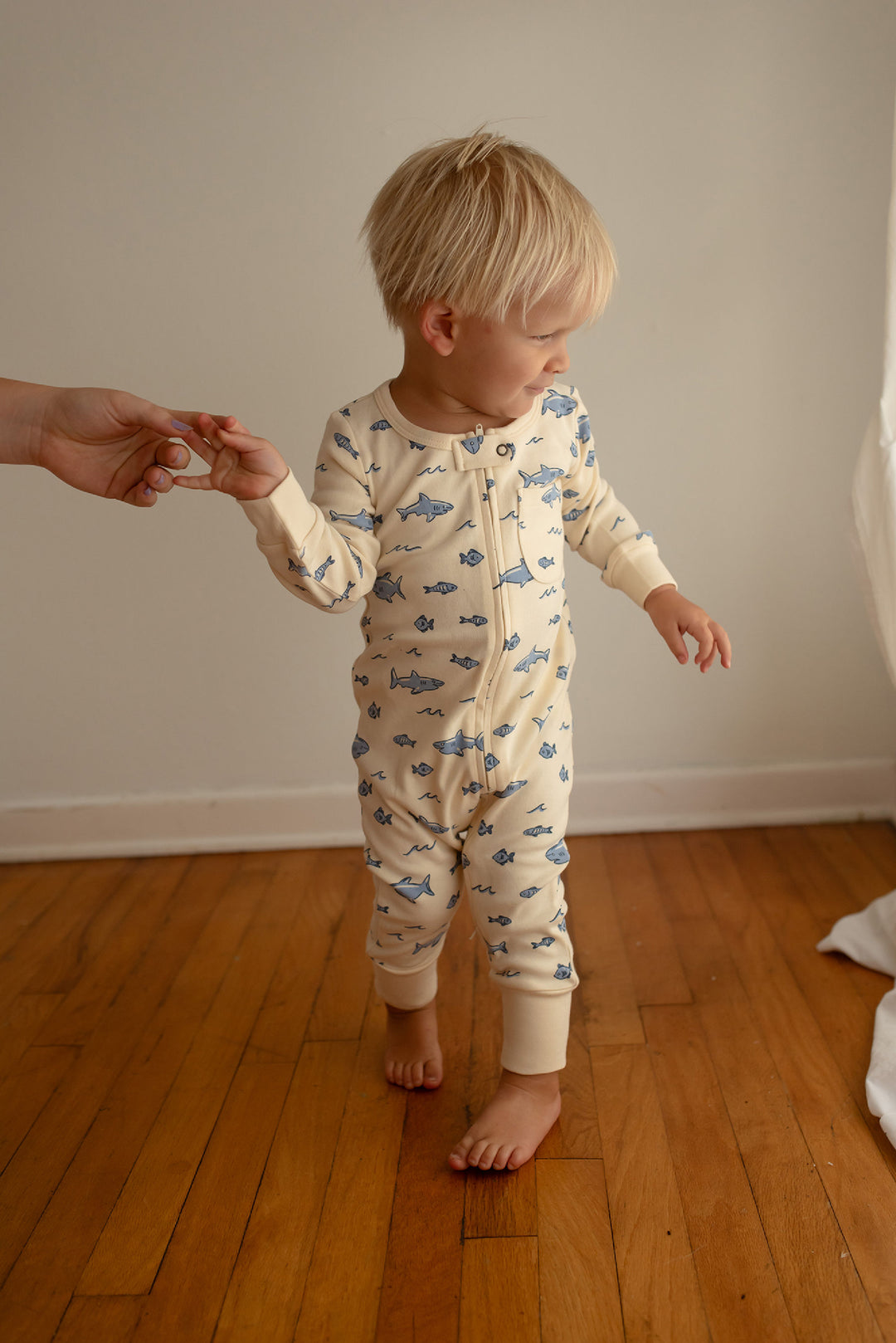 Child wearing Organic Footless 2-Way Zipper Romper in Shark.