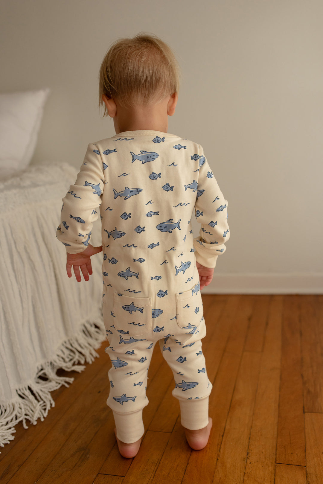 Child wearing Organic Footless 2-Way Zipper Romper in Shark.