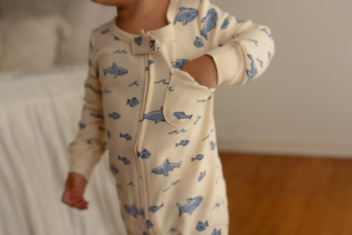 Child wearing Organic Footless 2-Way Zipper Romper in Shark.