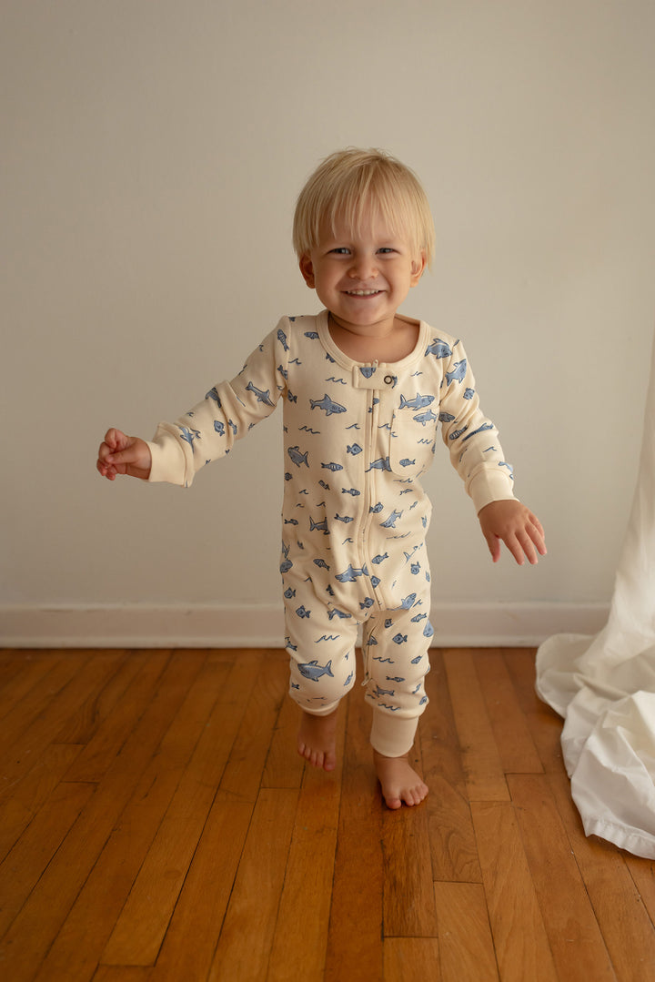 Child wearing Organic Footless 2-Way Zipper Romper in Shark.