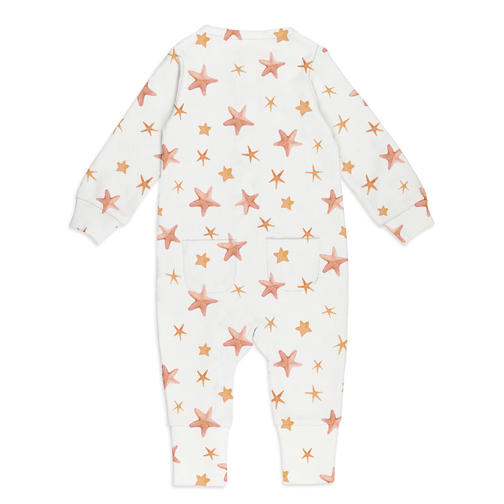 flat image of 2-way footless zipper romper backside in starfish print, with drop shadow