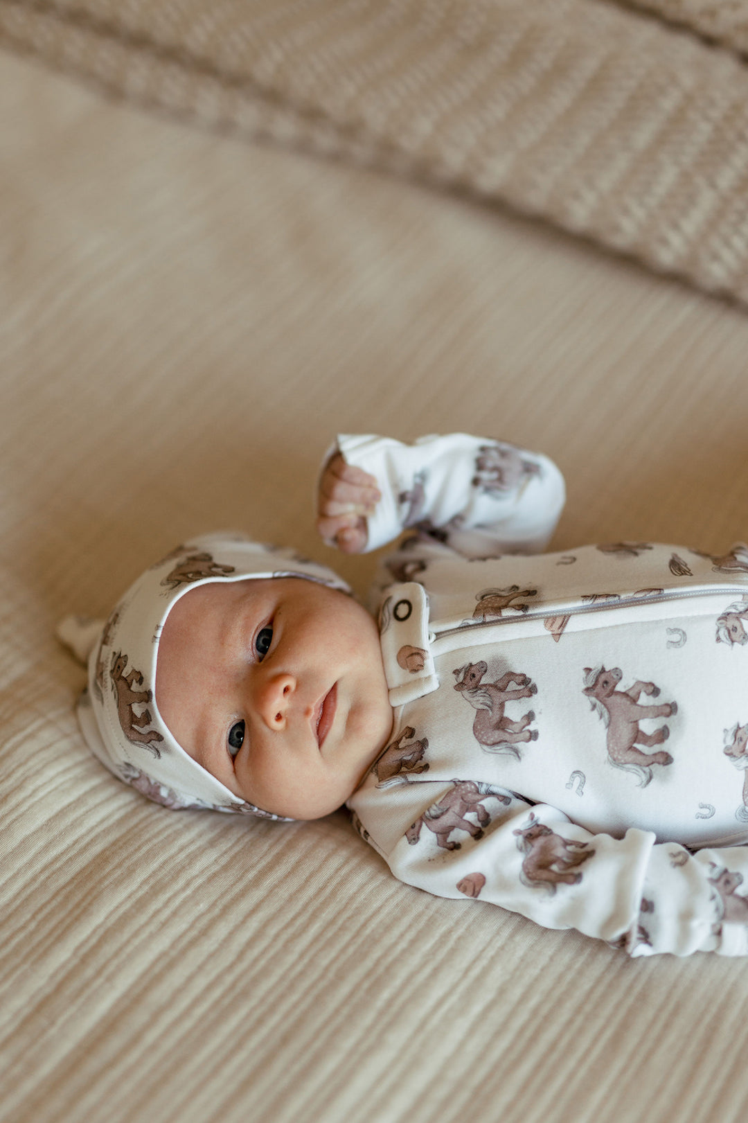 Child wearing Organic 2-Way Zipper Footie in Little Lasso.
