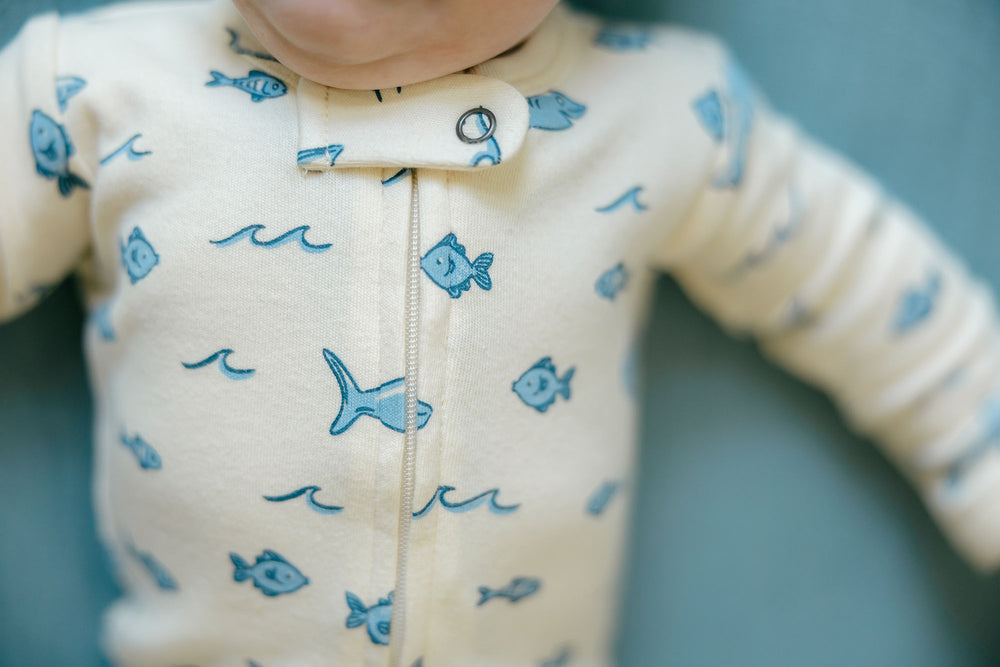 Child wearing Organic 2-Way Zipper Footie in Shark.