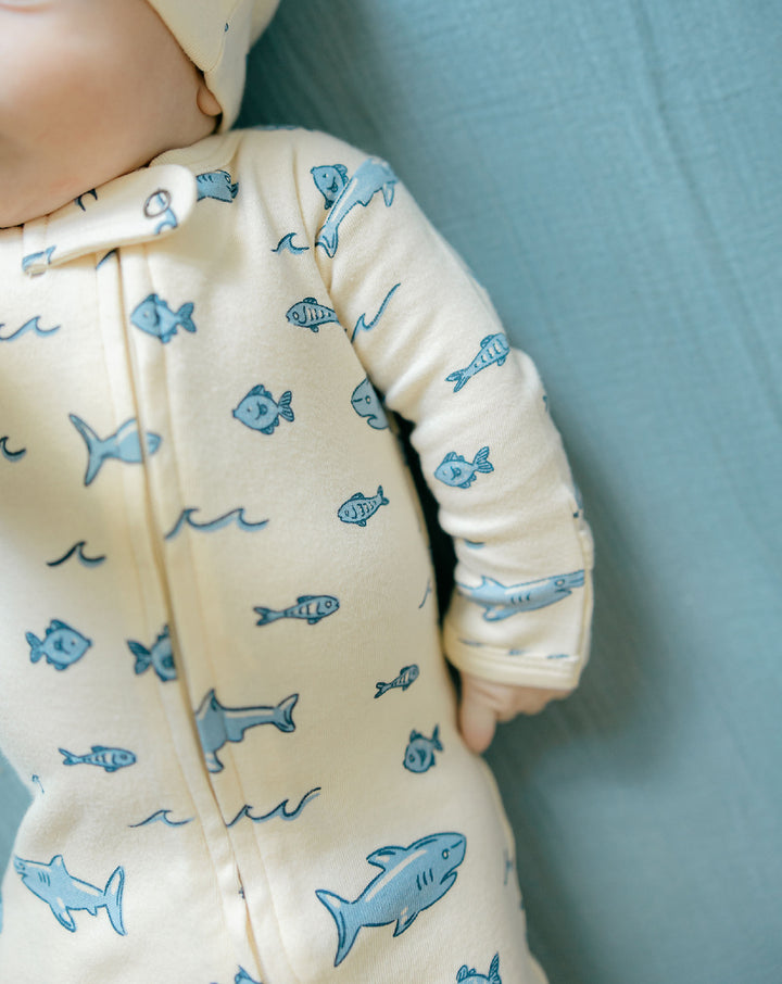Child wearing Organic 2-Way Zipper Footie in Shark.