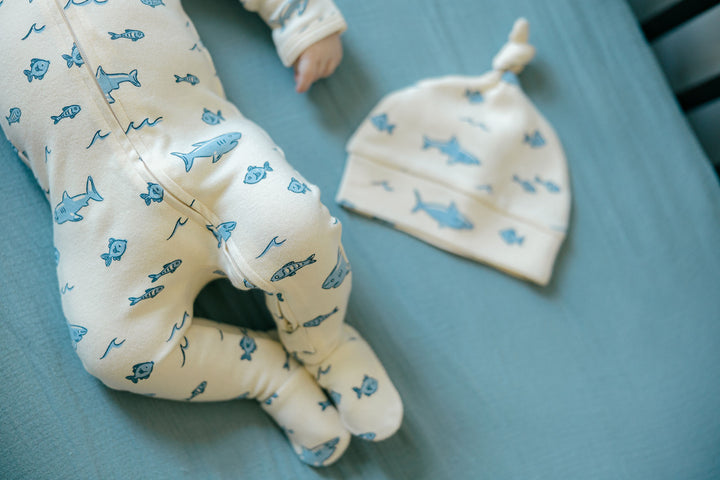 Child wearing Organic 2-Way Zipper Footie in Shark.