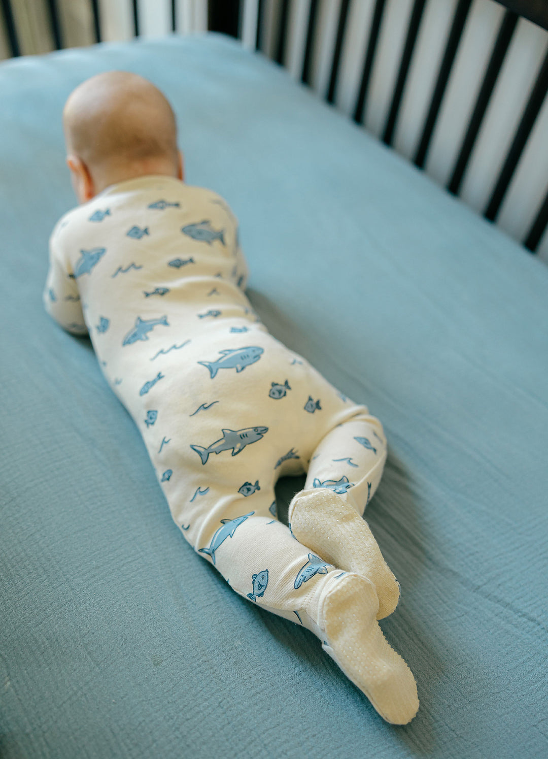 Child wearing Organic 2-Way Zipper Footie in Shark.