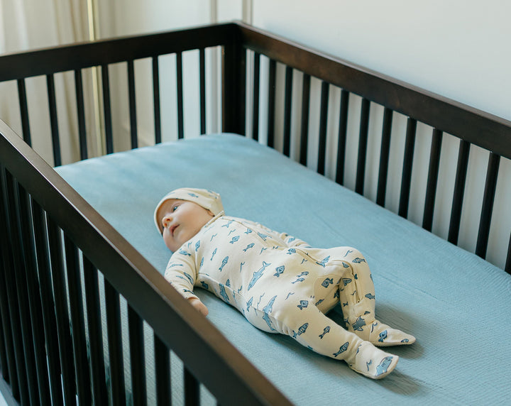 Child wearing Organic 2-Way Zipper Footie in Shark.