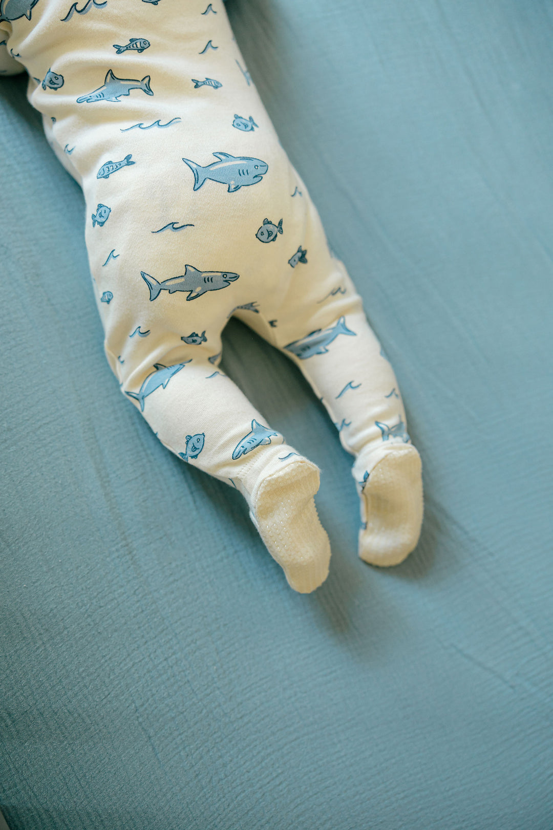 Child wearing Organic 2-Way Zipper Footie in Shark.