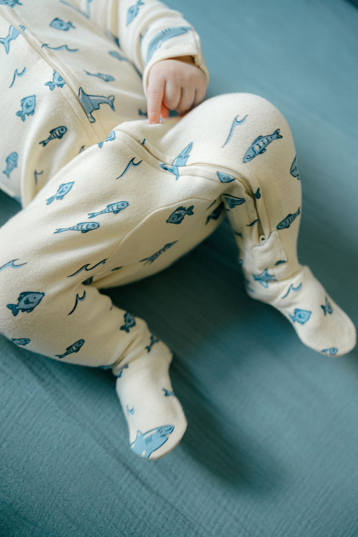Child wearing Organic 2-Way Zipper Footie in Shark.