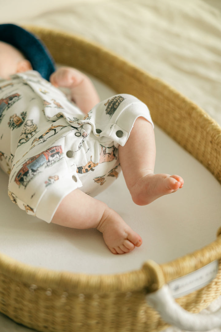 Child wearing Organic S/Sleeve Coverall in Farm Friends.