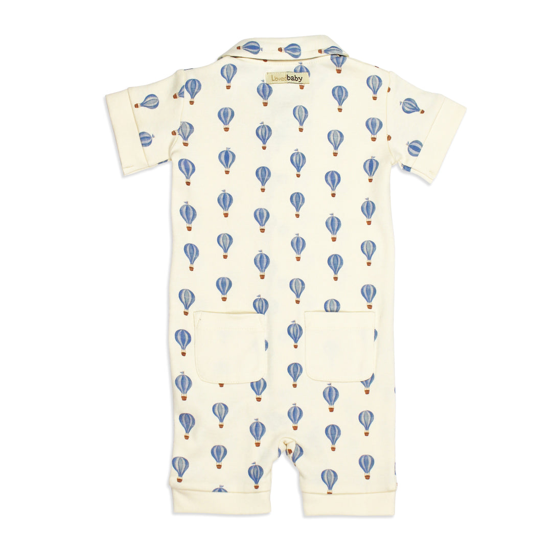 flat image of s/sleeve button-up coverall in blue hot air balloon print (back side)