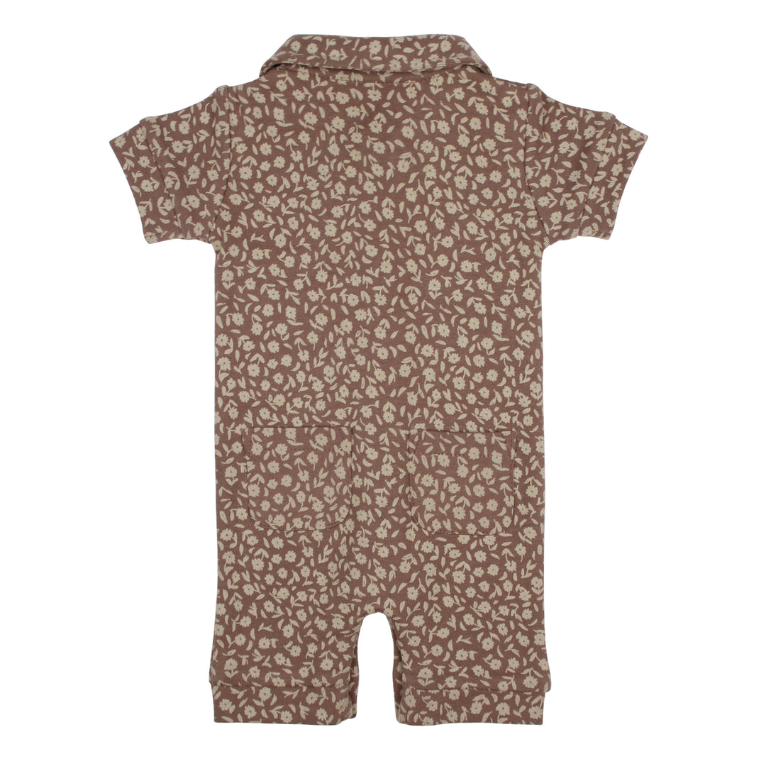Flat photo showing back side of S/Sleeve Coverall with latte base fabric and oatmeal colored floral print.