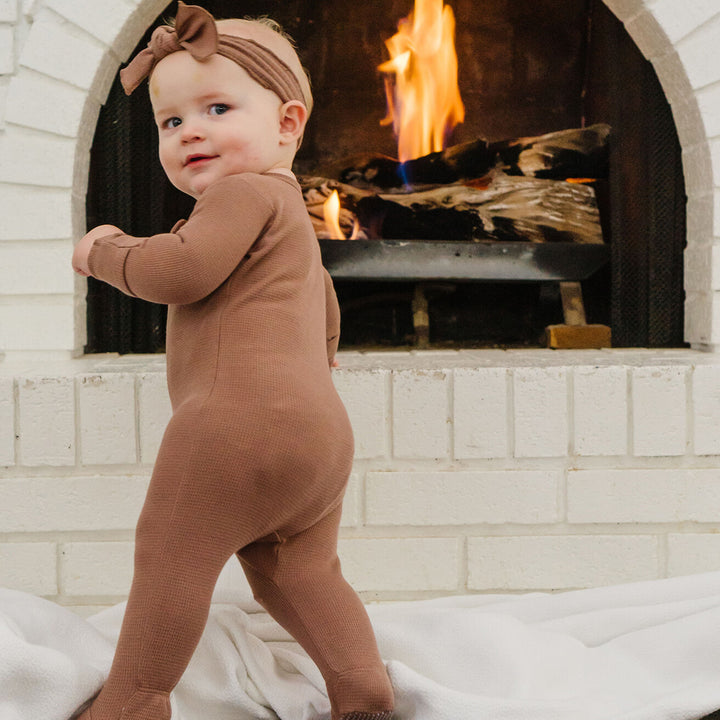Child wearing Thermal 2-Way Zipper Footie in Cocoa.