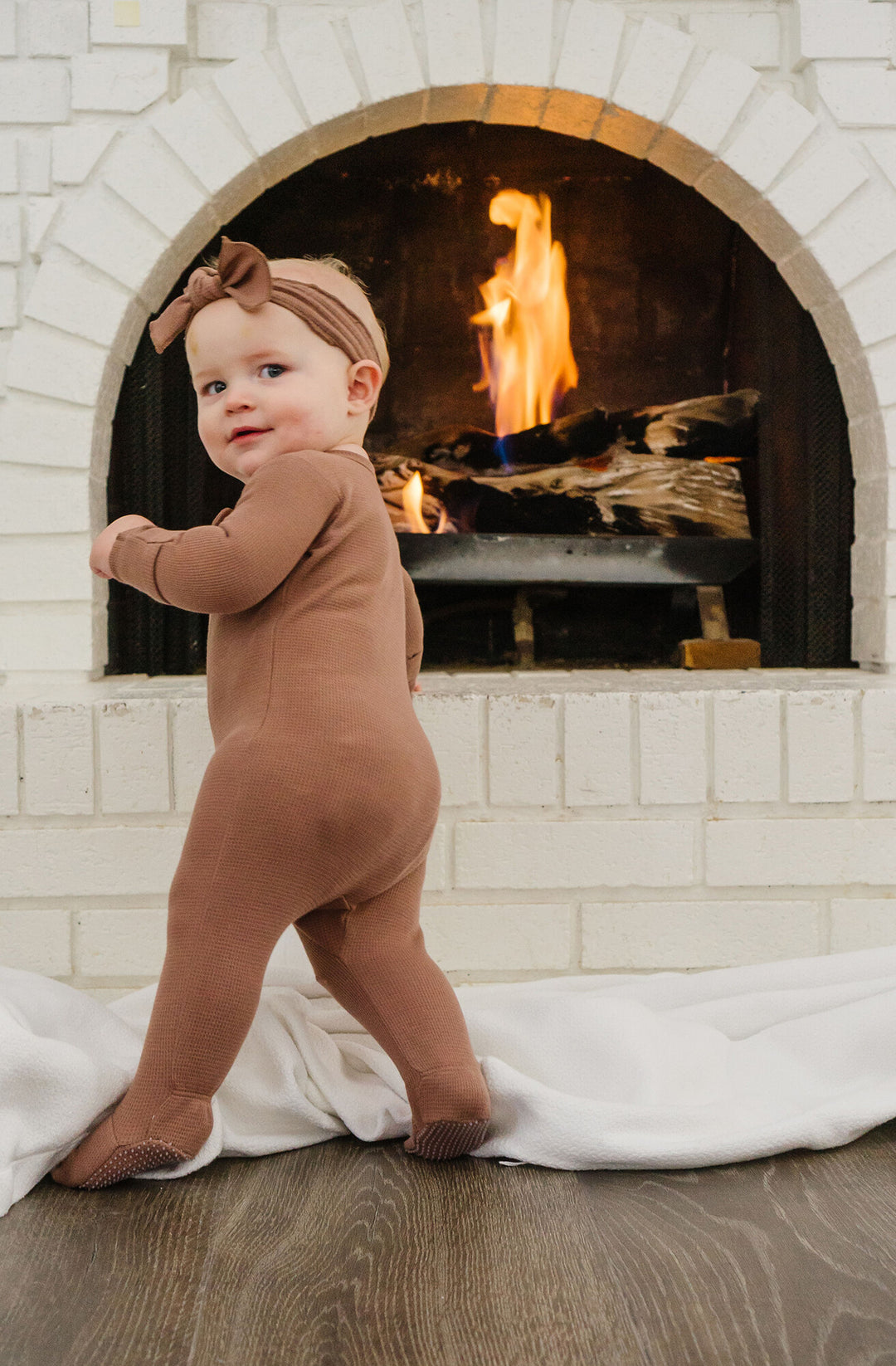 Child wearing Thermal 2-Way Zipper Footie in Cocoa.