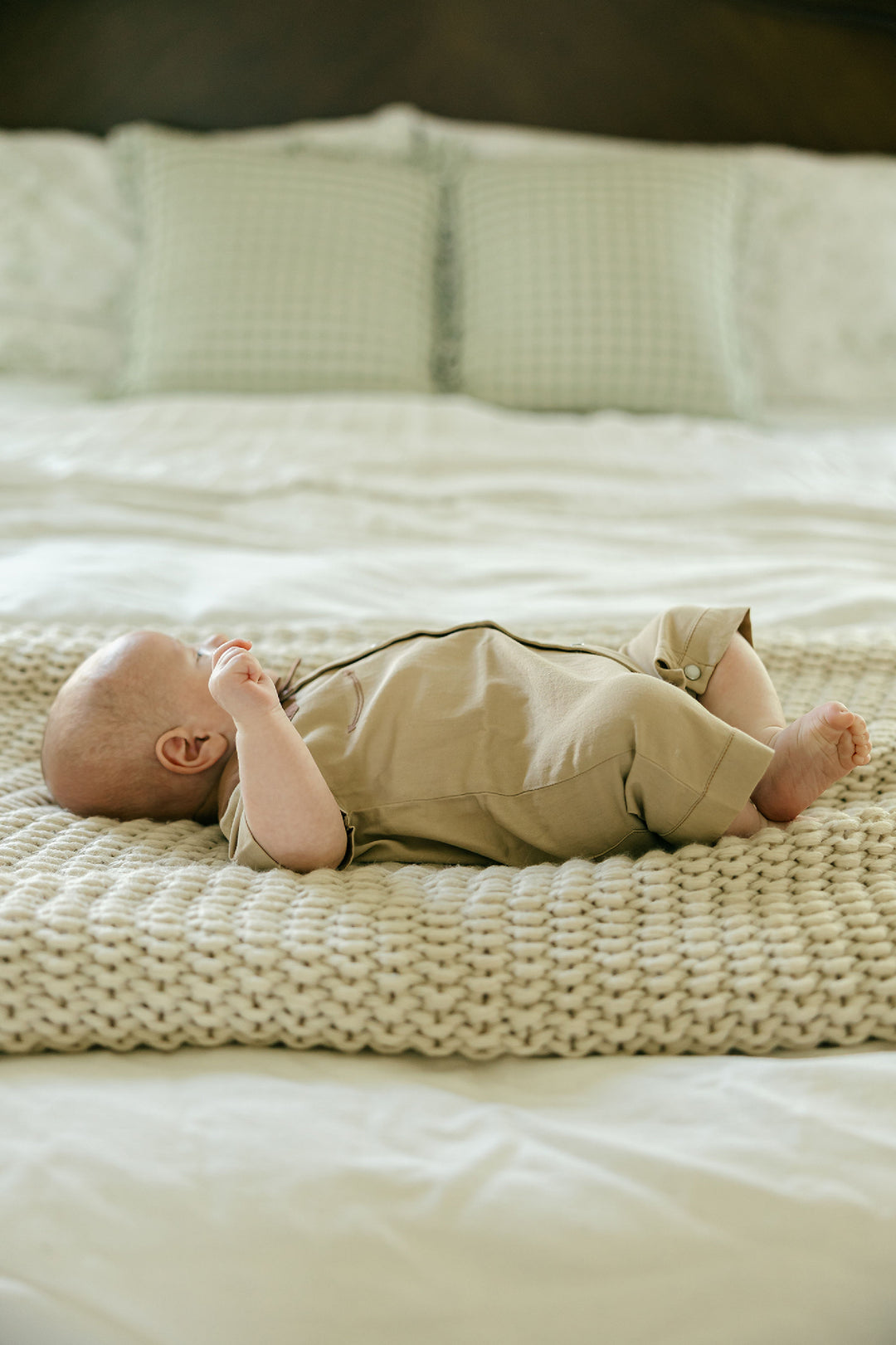 Child wearing Organic Western S/Sleeve Coverall in Oatmeal.