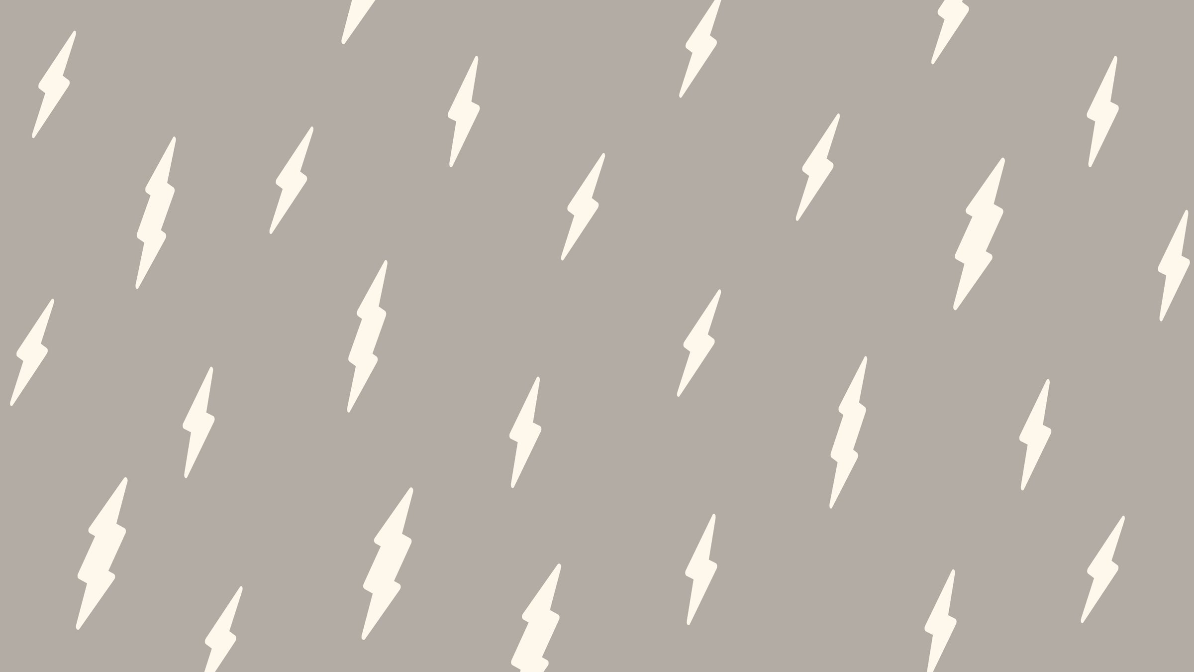 graphic featuring smoky grayish taupe background and buttercream colored lightning bolt allover print.