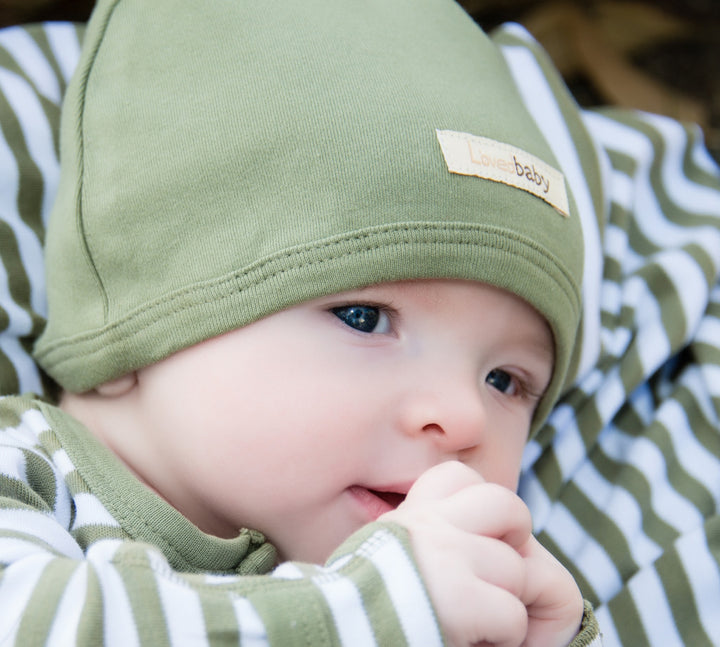 Child wearing Organic Cute Cap in Sage.