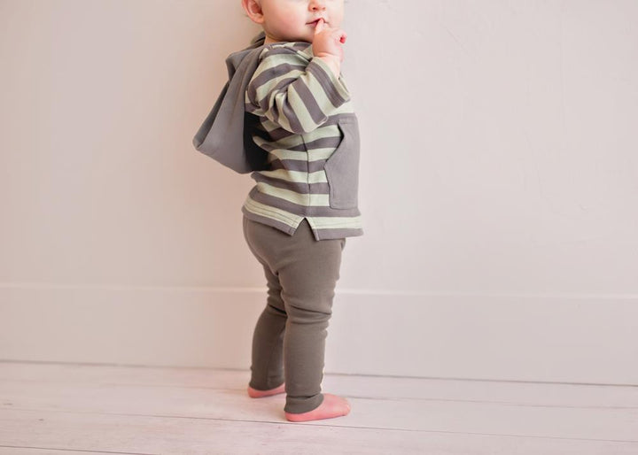 Child wearing Organic Hoodie in Gray/Seafoam Stripe.