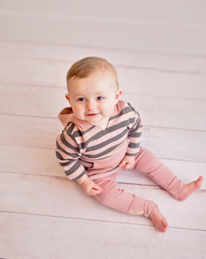 Child wearing Organic Hoodie in Mauve/Gray Stripe.