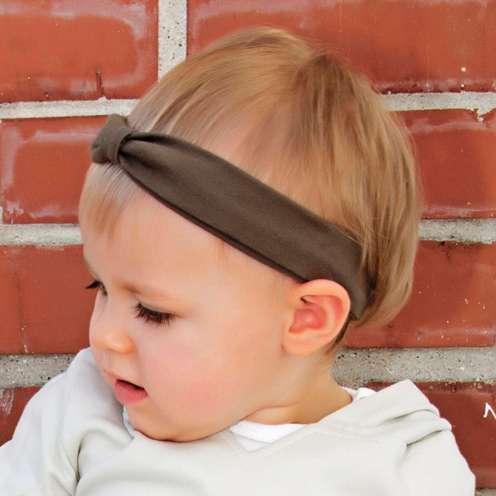 Child wearing Organic Headband in Bark.