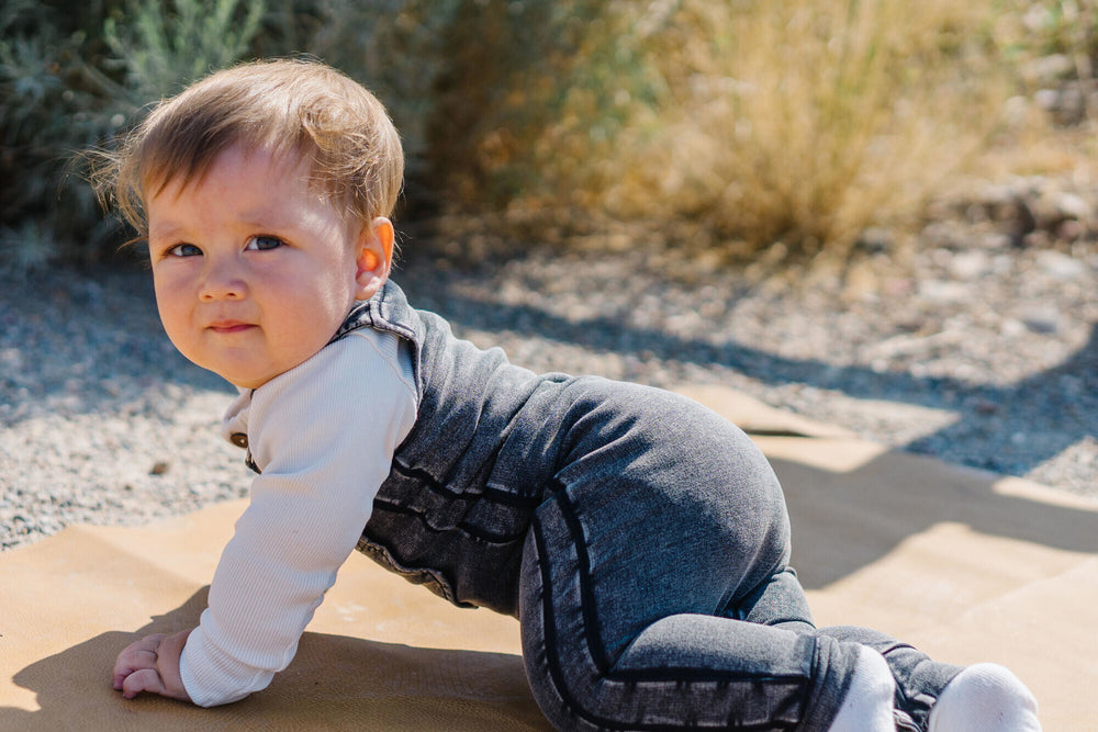 Child wearing Faux Denim Overall in Black.
