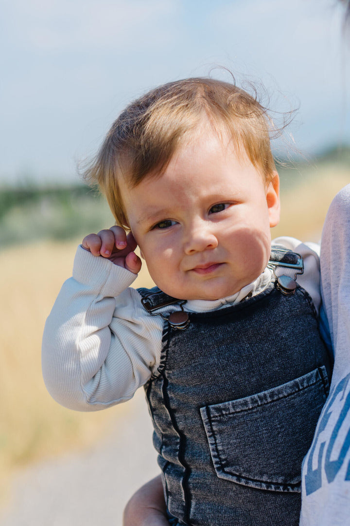 Child wearing Faux Denim Overall in Black.