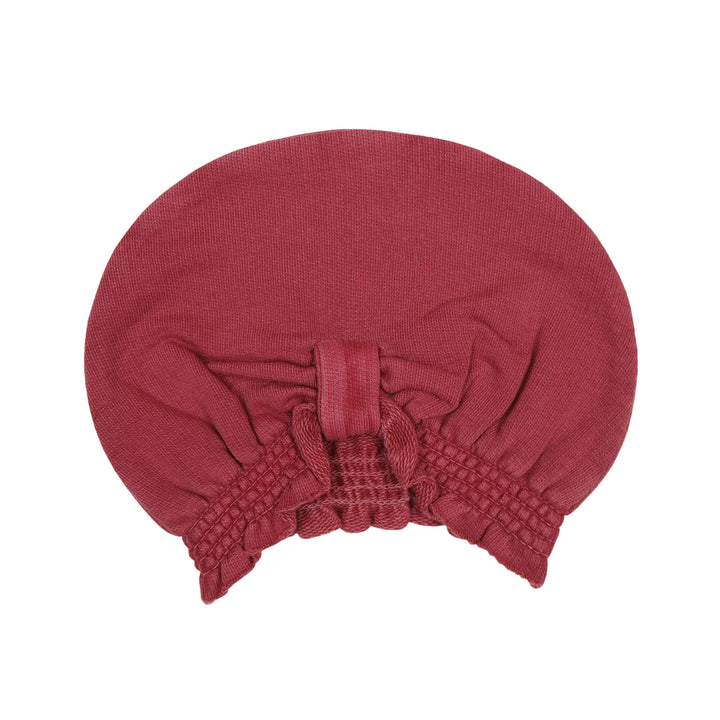 French Terry Knotted Turban in Appleberry, a dark, dusky pink color.