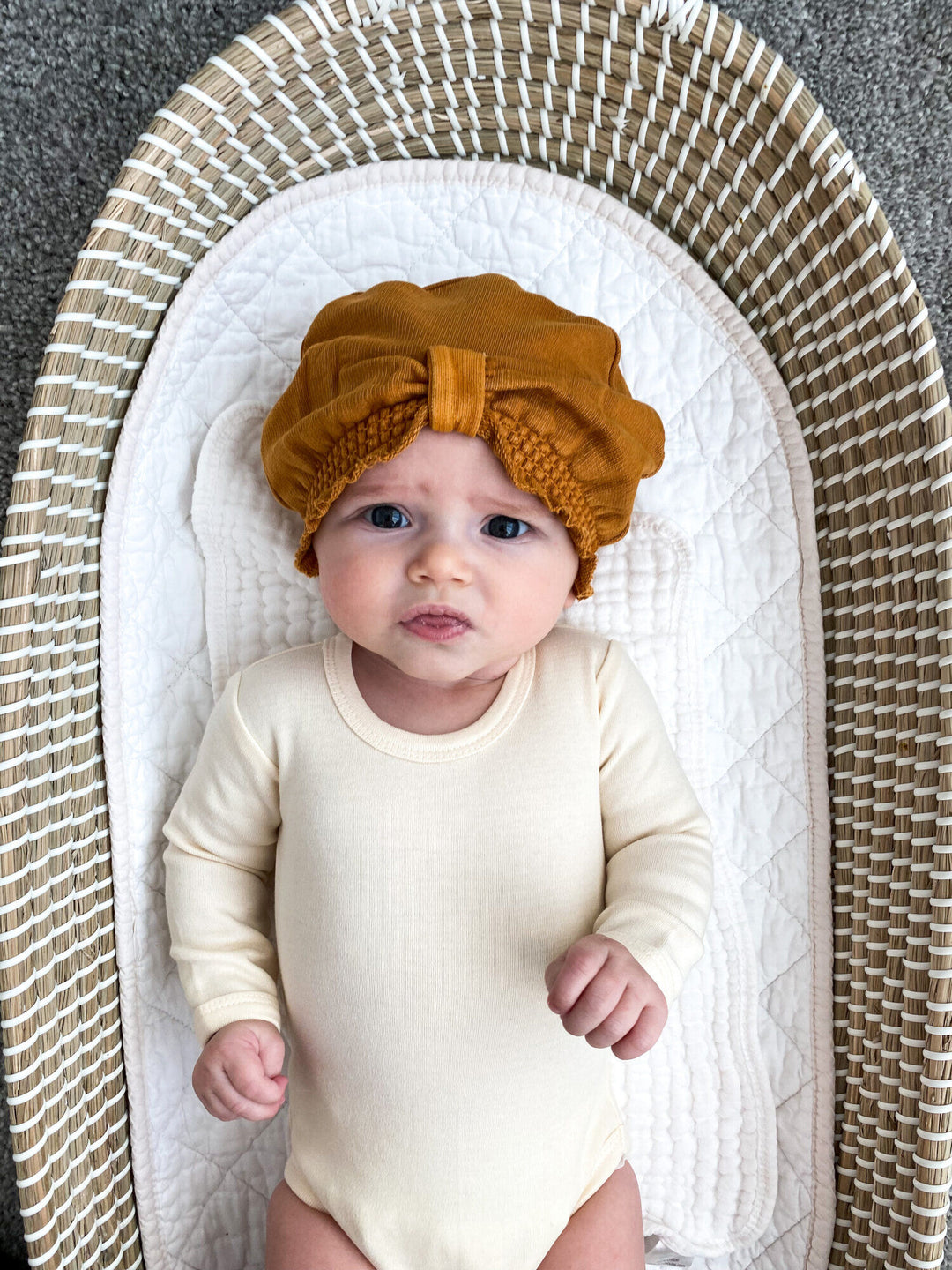 Child wearing French Terry Knotted Turban in Butterscotch.