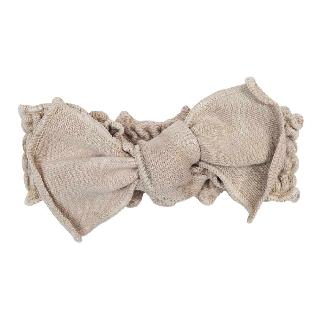 French Terry Smocked Headband in Oatmeal, a light tan color.