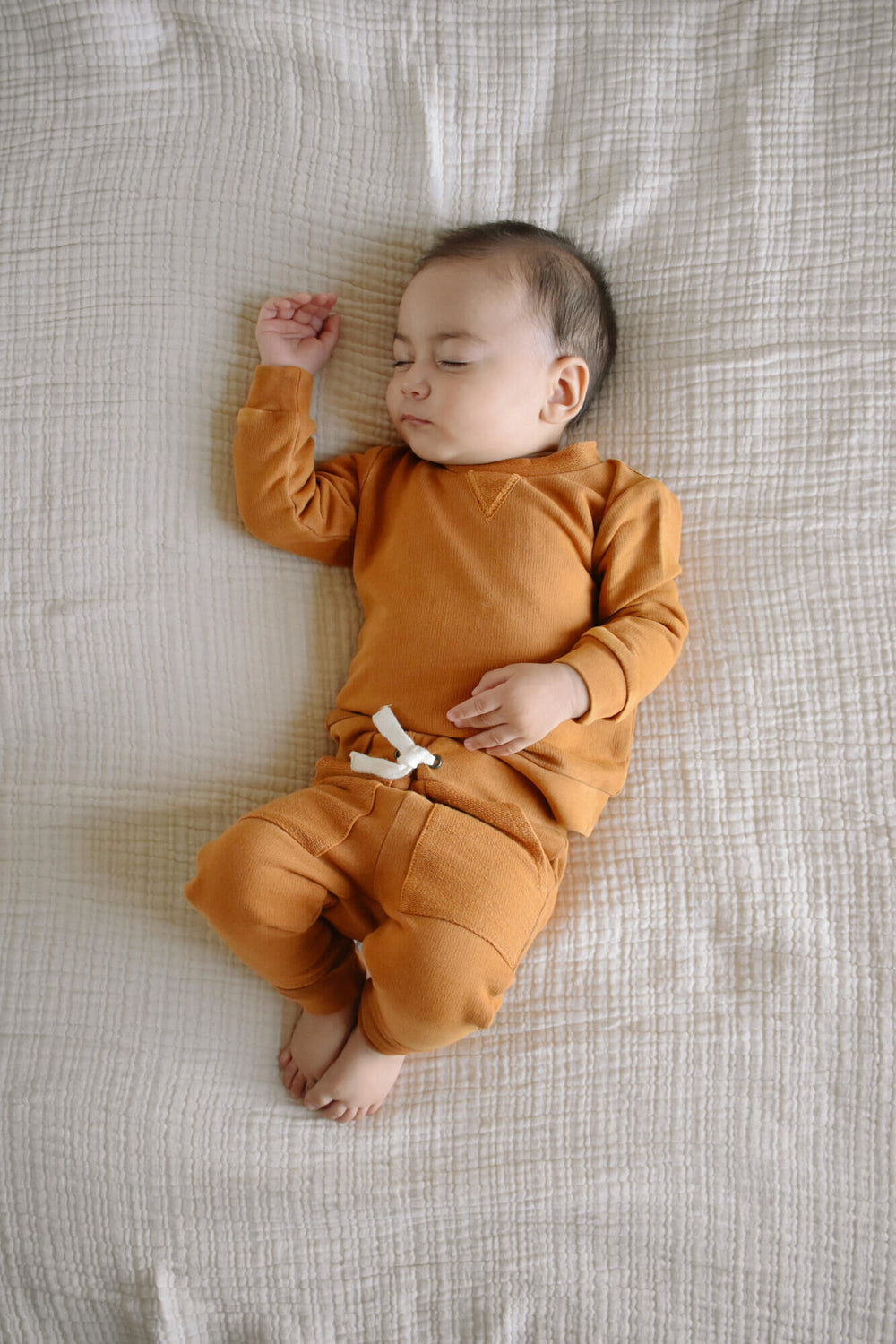 Child wearing French Terry Sweatshirt & Jogger Set in Butterscotch.