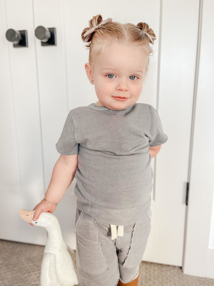 Child wearing Kids' French Terry Shorts & Tee Set in Mist.