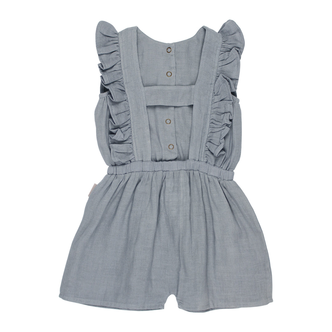 Back view of Kids' Organic Muslin Ruffle Jumper in Twilight.