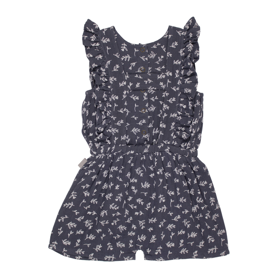 Back view of Kids' Organic Muslin Ruffle Jumper in Dusk Leaves.