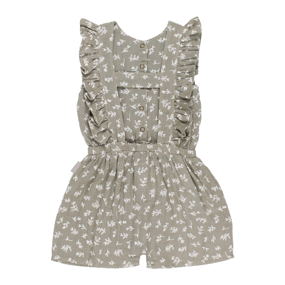 Back view of Kids' Organic Muslin Ruffle Jumper in Fawn Leaves.