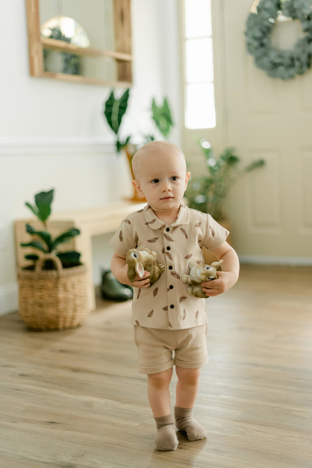 Child wearing Kids' Cuffed Shorts in Oatmeal.